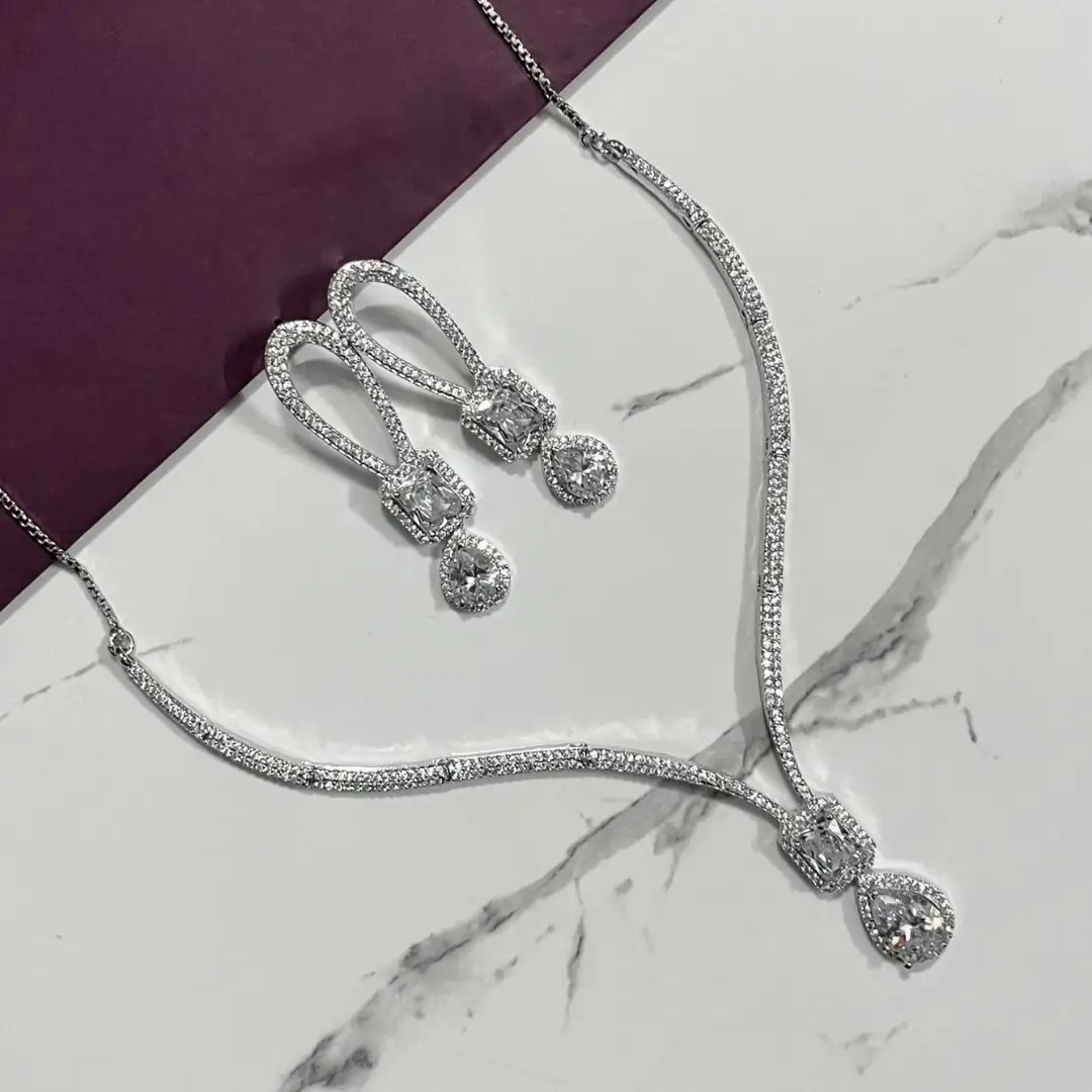 Elegant-White Zircon-Necklace-Set Elegant White Zircon Necklace Set – Teardrop Pendant with Loop Earrings - Image 1