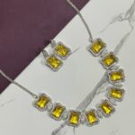 Sunlit Sparkle Yellow Stone Necklace Set – Silver Finish with Zircon Border