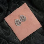 Elegant Teardrop Stud Earrings with Floral Design