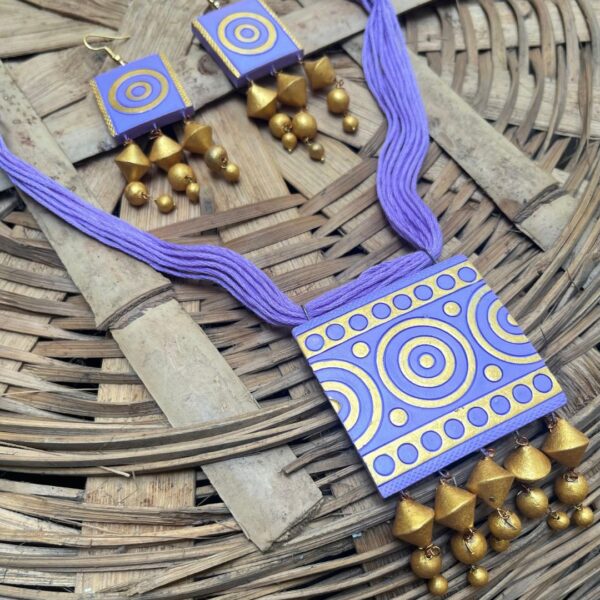 Royal Orbit – Purple and Gold Handcrafted Necklace Set with Terracotta Detailing