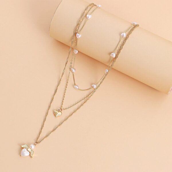 Fashion Multilayer Heart shaped Pearl Angel Wings Alloy Necklace For Female With Electroplating Treatment