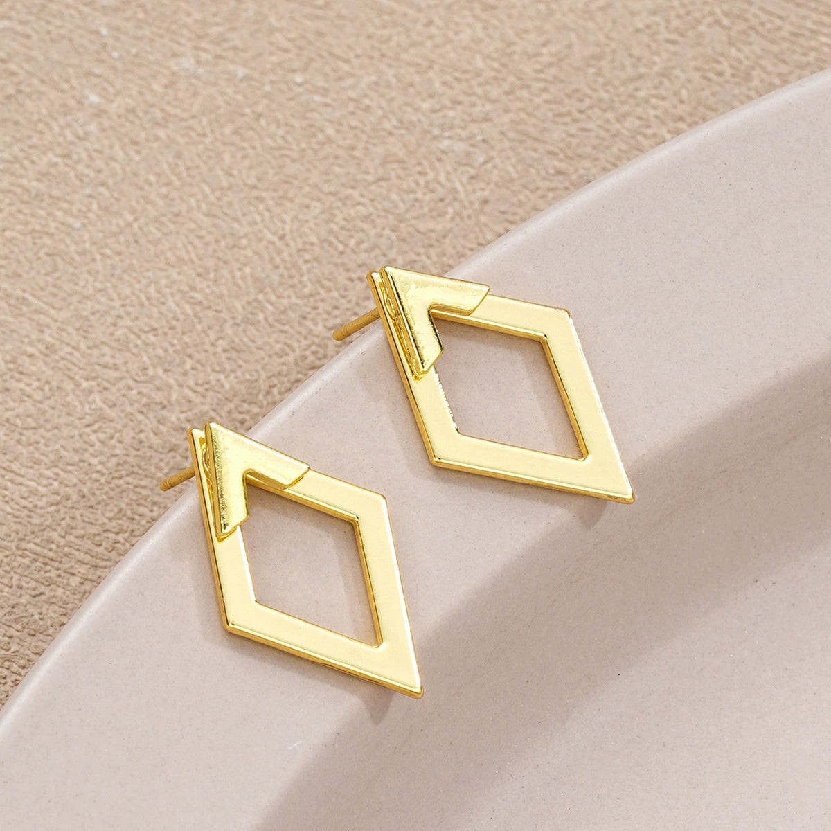 simple-geometric-alloy-earrings-with-diamond-hollow-design-and-electroplating-for-women_b Simple Geometric Alloy Earrings With Diamond Hollow Design And Electroplating For Women - Image 1